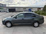 Skoda Rapid 2014 года за 2 800 000 тг. в Астана – фото 2