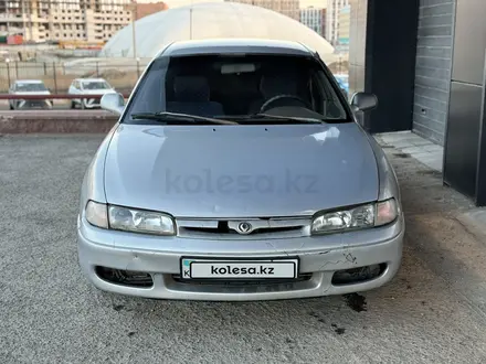 Mazda 626 1993 года за 1 100 000 тг. в Астана – фото 2