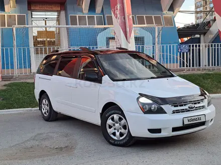 Kia Carnival 2009 года за 7 500 000 тг. в Актобе – фото 2