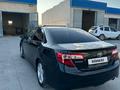 Toyota Camry 2014 года за 9 000 000 тг. в Жанаозен – фото 4