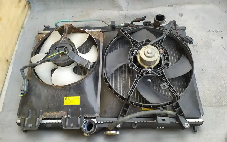 Радиатор на Mitsubishi Carisma за 100 тг. в Шымкент