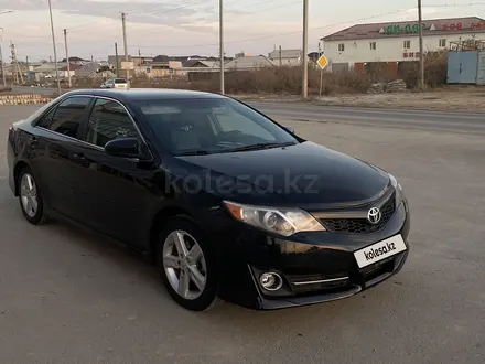 Toyota Camry 2012 года за 8 300 000 тг. в Жанаозен – фото 2