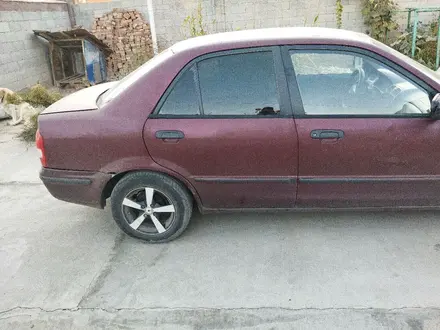 Mazda 323 1998 года за 1 000 000 тг. в Алматы – фото 7