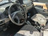 Mitsubishi Pajero iO 2005 года за 2 600 000 тг. в Астана – фото 2