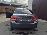 Chevrolet Cruze 2011 года за 3 300 000 тг. в Алтай – фото 5