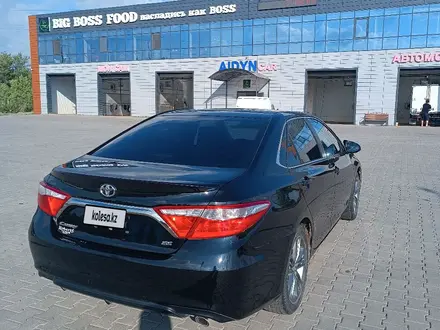 Toyota Camry 2015 года за 7 000 000 тг. в Актобе – фото 6