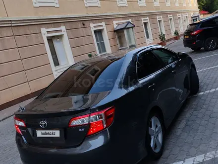 Toyota Camry 2014 года за 6 500 000 тг. в Актобе – фото 7