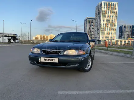 Mazda 626 1998 года за 2 500 000 тг. в Астана – фото 7