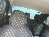 Renault Logan 2013 года за 1 700 000 тг. в Актобе – фото 2