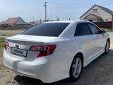 Toyota Camry 2014 года за 8 700 000 тг. в Уральск