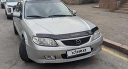Mazda 323 2002 года за 1 680 000 тг. в Алматы – фото 2
