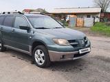 Mitsubishi Outlander 2004 годаүшін3 250 000 тг. в Алматы