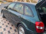 Mazda 323 1999 года за 2 200 000 тг. в Шымкент – фото 4