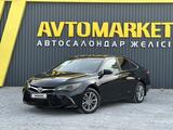 Toyota Camry 2015 года за 8 490 000 тг. в Актобе