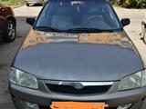 Mazda 323 1999 года за 1 600 000 тг. в Актобе – фото 4