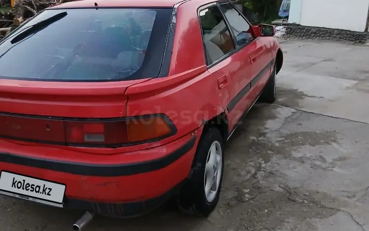 Mazda 323 1991 годаүшін380 000 тг. в Алматы