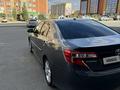 Toyota Camry 2014 годаүшін7 800 000 тг. в Актобе – фото 3