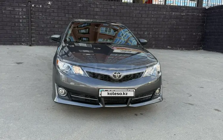 Toyota Camry 2014 годаүшін7 800 000 тг. в Актобе