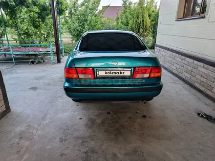 Toyota Carina E 1997 года за 3 100 000 тг. в Шымкент – фото 9
