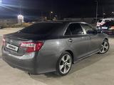 Toyota Camry 2014 года за 7 600 000 тг. в Атырау – фото 3