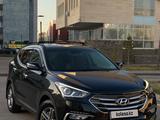 Hyundai Santa Fe 2017 года за 9 900 000 тг. в Алматы