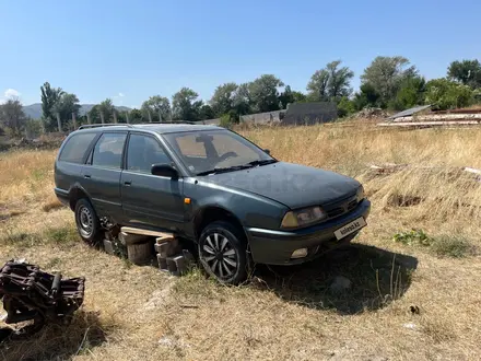 Nissan Primera 1994 года за 650 000 тг. в Есик – фото 2