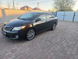 Toyota Corolla 2011 года за 6 300 000 тг. в Актобе – фото 2