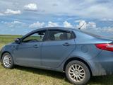 Kia Rio 2014 года за 4 000 000 тг. в Державинск