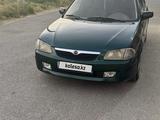 Mazda 323 1999 года за 1 800 000 тг. в Шымкент