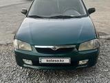 Mazda 323 1999 года за 1 800 000 тг. в Шымкент – фото 2
