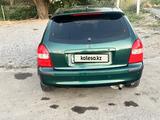 Mazda 323 1999 года за 1 800 000 тг. в Шымкент – фото 4