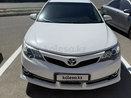 Toyota Camry 2014 года за 6 600 000 тг. в Атырау