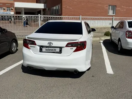 Toyota Camry 2014 года за 6 600 000 тг. в Атырау – фото 4