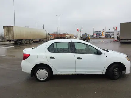 Renault Logan 2014 года за 2 500 000 тг. в Уральск – фото 4