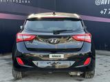 Hyundai Elantra 2014 года за 7 190 000 тг. в Актобе – фото 4