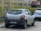 Renault Sandero 2015 года за 2 200 000 тг. в Астана – фото 3
