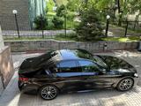 BMW 520 2023 года за 31 500 000 тг. в Алматы – фото 4
