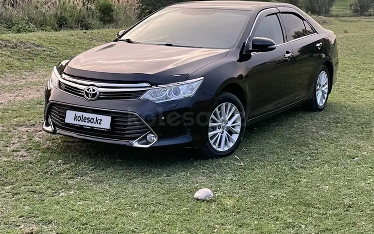 Toyota Camry 2014 года за 11 100 000 тг. в Шымкент