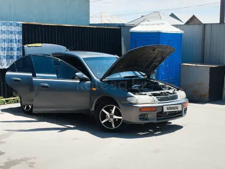 Mazda 323 1996 года за 730 000 тг. в Алматы – фото 4