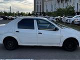 Renault Logan 2015 года за 2 450 000 тг. в Астана – фото 2