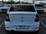 Renault Logan 2015 года за 2 450 000 тг. в Астана – фото 4