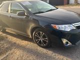 Toyota Camry 2014 годаfor6 300 000 тг. в Тараз