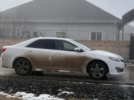 Toyota Camry 2014 года за 7 600 000 тг. в Жанаозен – фото 10
