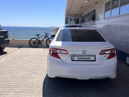 Toyota Camry 2014 года за 7 600 000 тг. в Жанаозен – фото 13