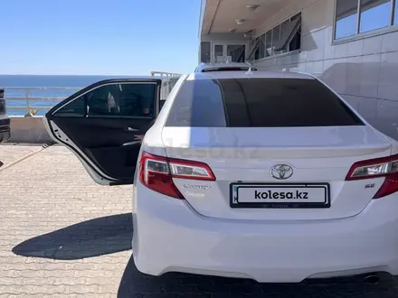 Toyota Camry 2014 года за 7 600 000 тг. в Жанаозен – фото 14