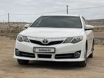 Toyota Camry 2014 года за 7 600 000 тг. в Жанаозен – фото 15