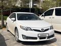 Toyota Camry 2014 года за 7 600 000 тг. в Жанаозен