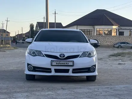 Toyota Camry 2014 года за 7 600 000 тг. в Жанаозен – фото 7