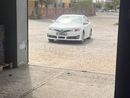Toyota Camry 2014 года за 7 600 000 тг. в Жанаозен – фото 8