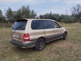 Kia Carnival 2001 годаүшін1 950 000 тг. в Алматы – фото 4